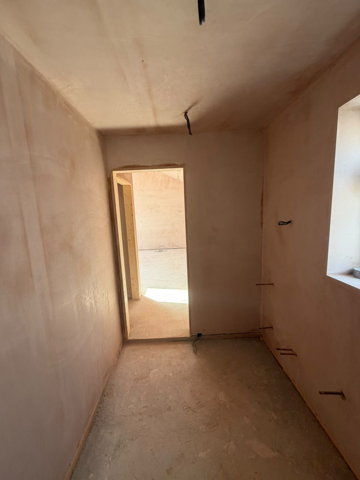 Plastered Hallway with Window Detail