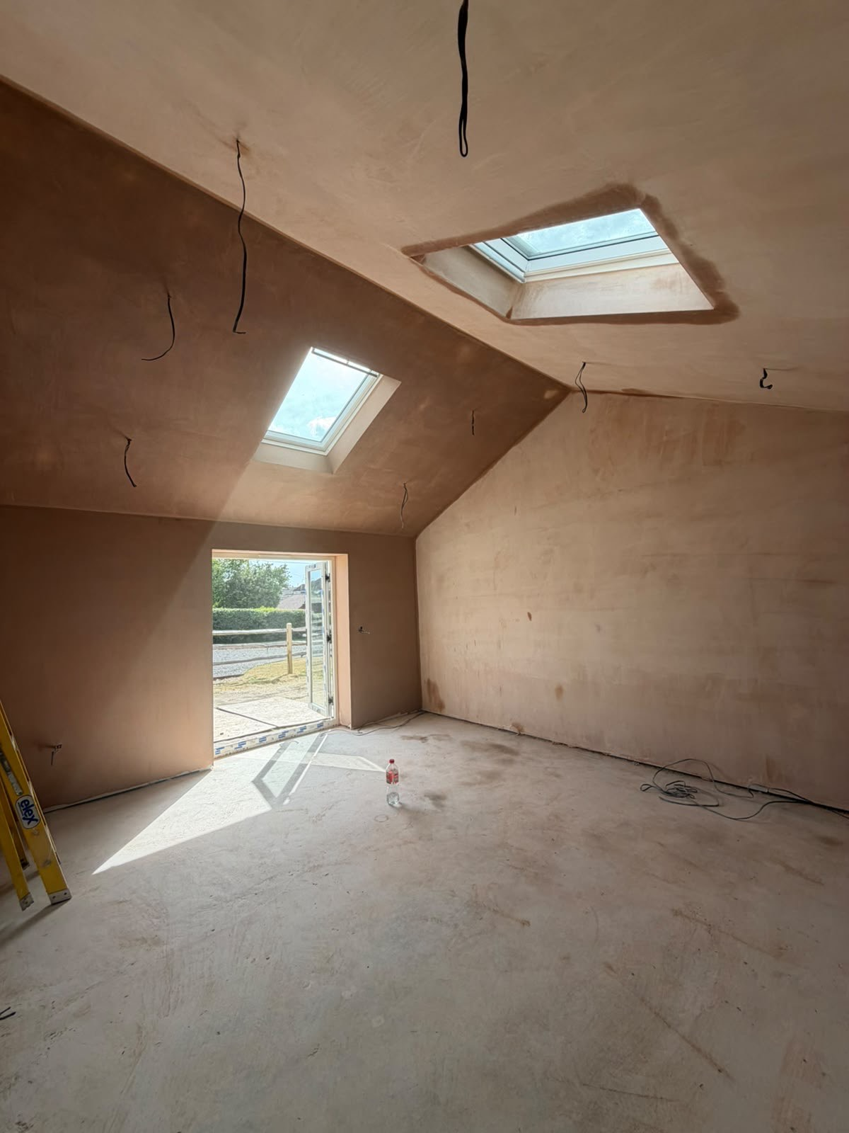 Fresh Plaster with Vaulted Ceiling & Skylights